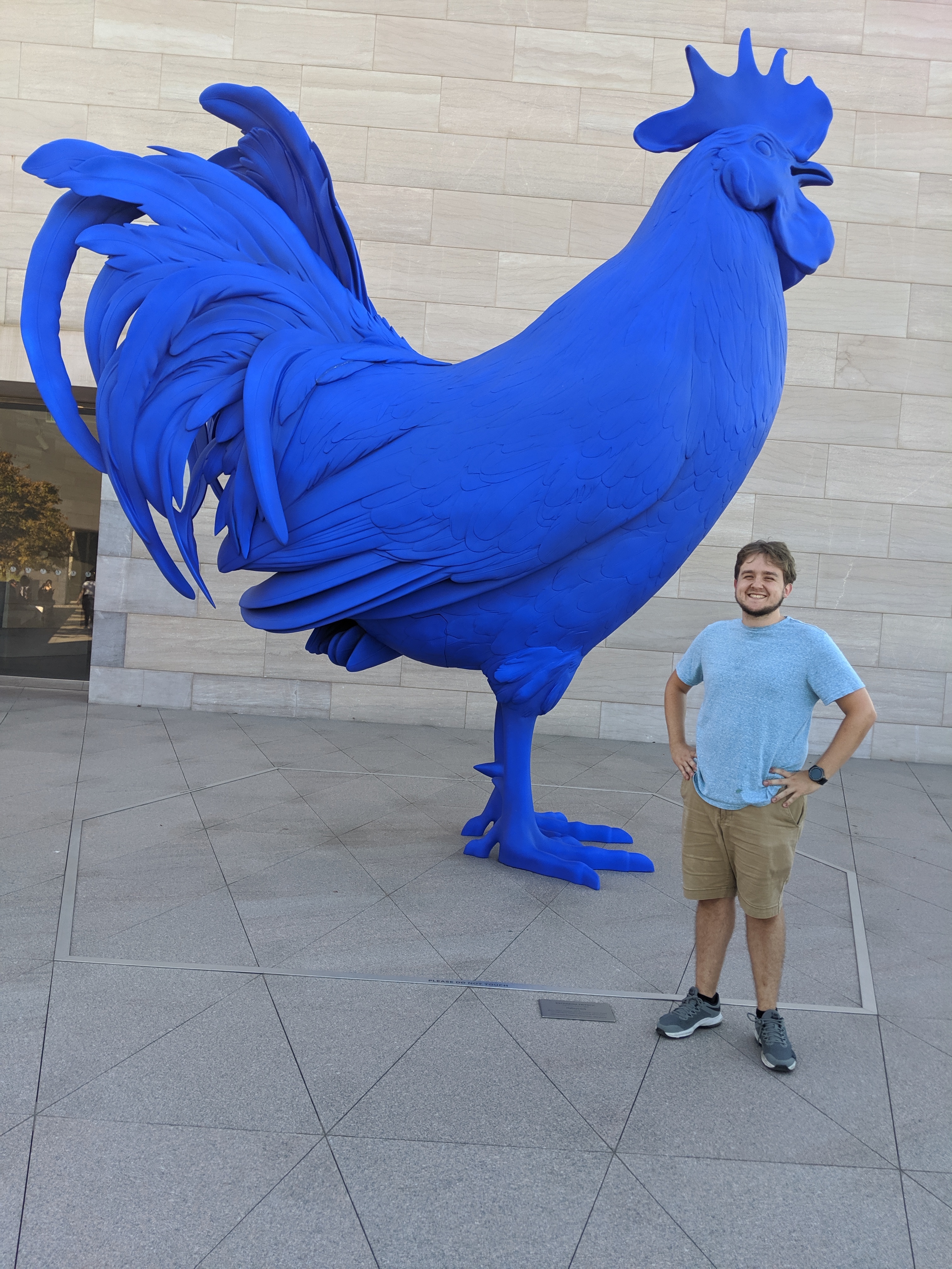 Me (right) with a large blue rooster