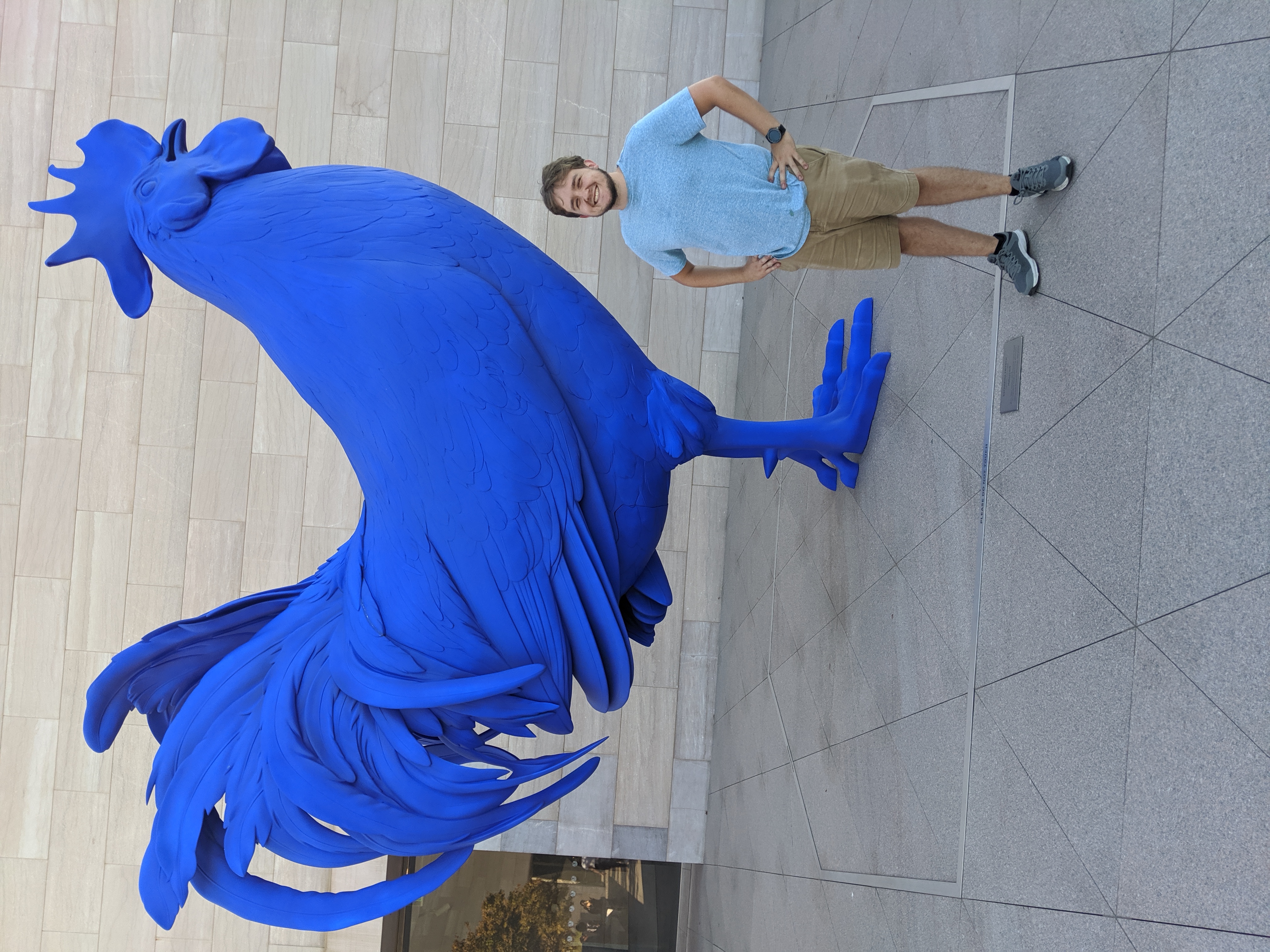 Me (right) with a large blue rooster
